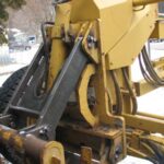 grapple attachment welding repair on log loader